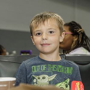 Jackson, 6, eats a summer meal at the Ken Rock Community Center in Rockford, Illinois.