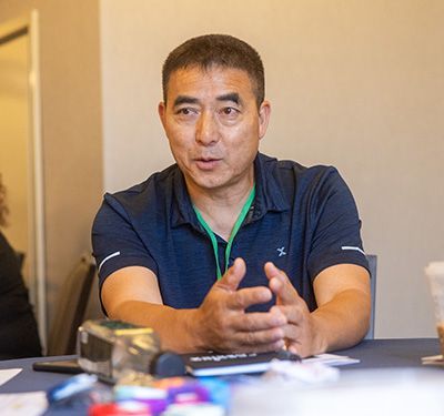 A man sitting at a table.